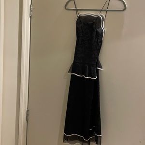 Sachin & Babi black cocktail dress. White detail, and subtle black lace.